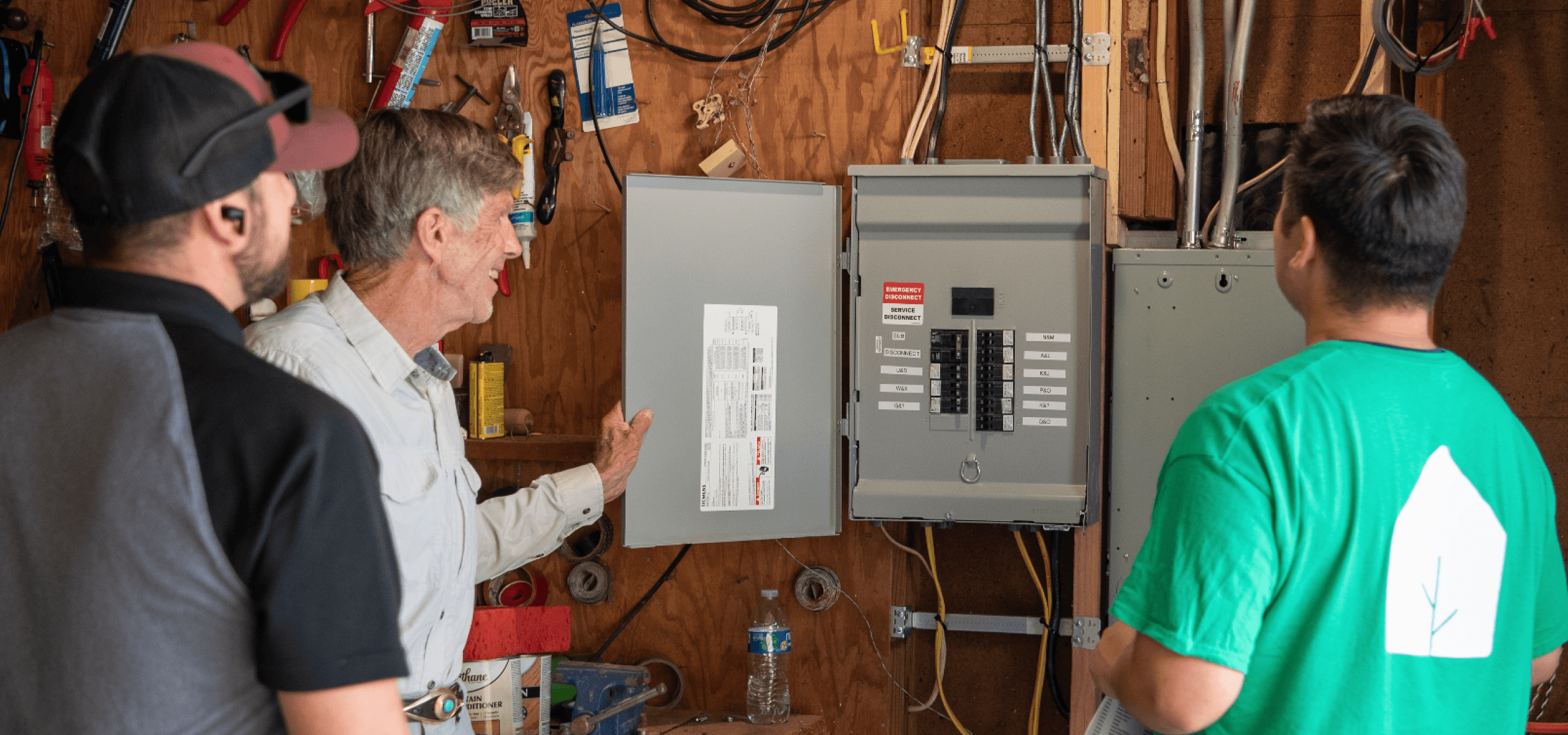 Image of Treehouse electricians installing a subpanel